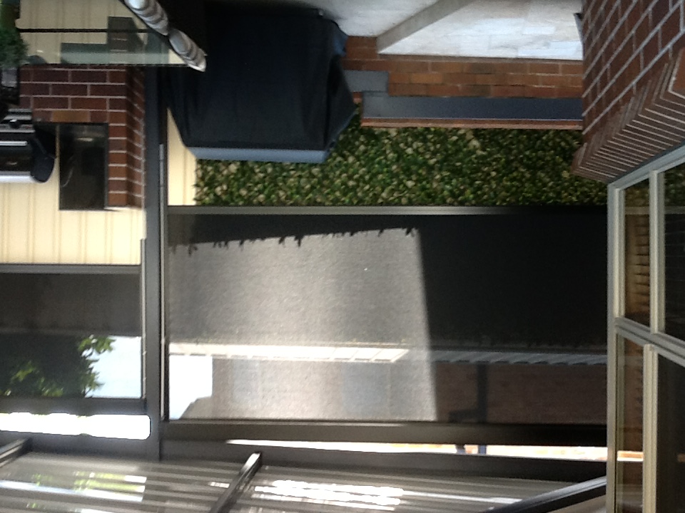 Zip screens on a residential exterior