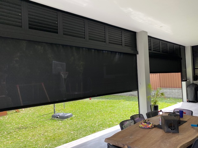 Zip screens on a covered patio with dining area